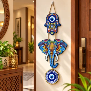 Colourful wooden elephant evil eye wall hanging displayed near a home entrance